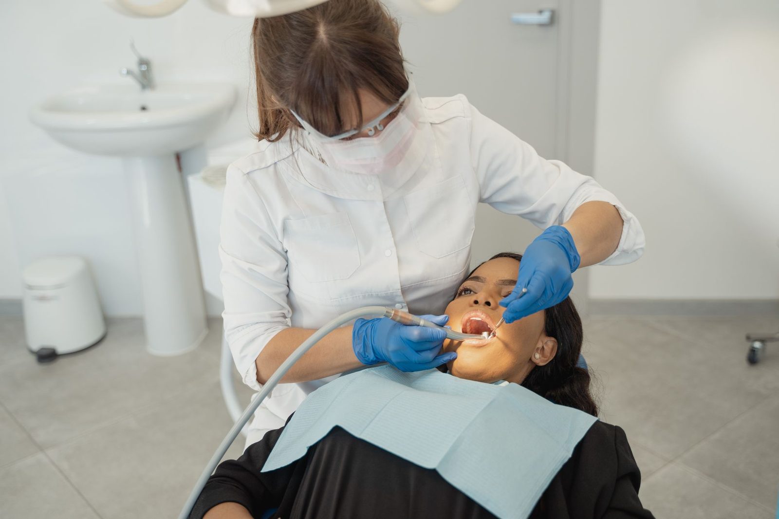 Dentist treating a patient